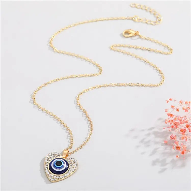 Bling Heart Evil Eye Necklace Xtina Cosmetics