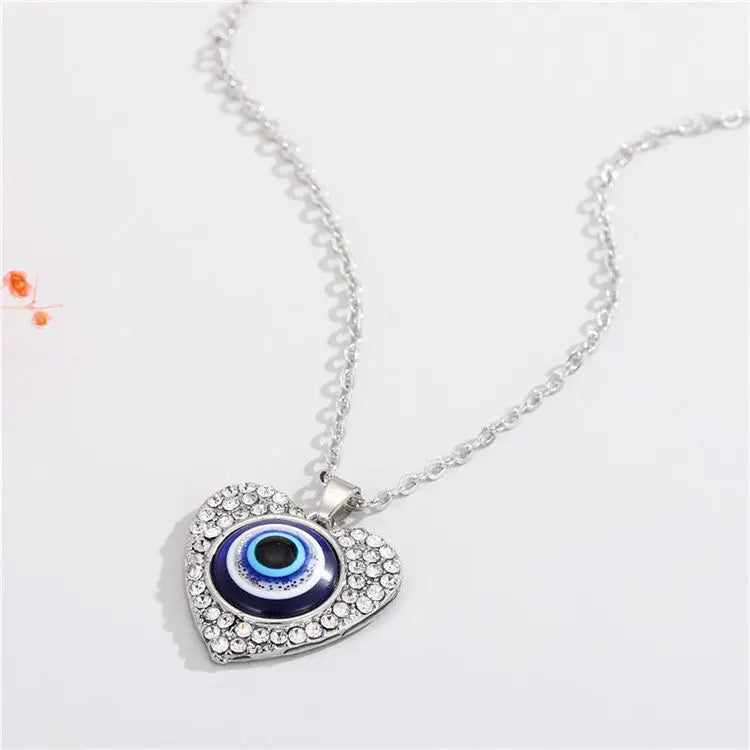Bling Heart Evil Eye Necklace Xtina Cosmetics