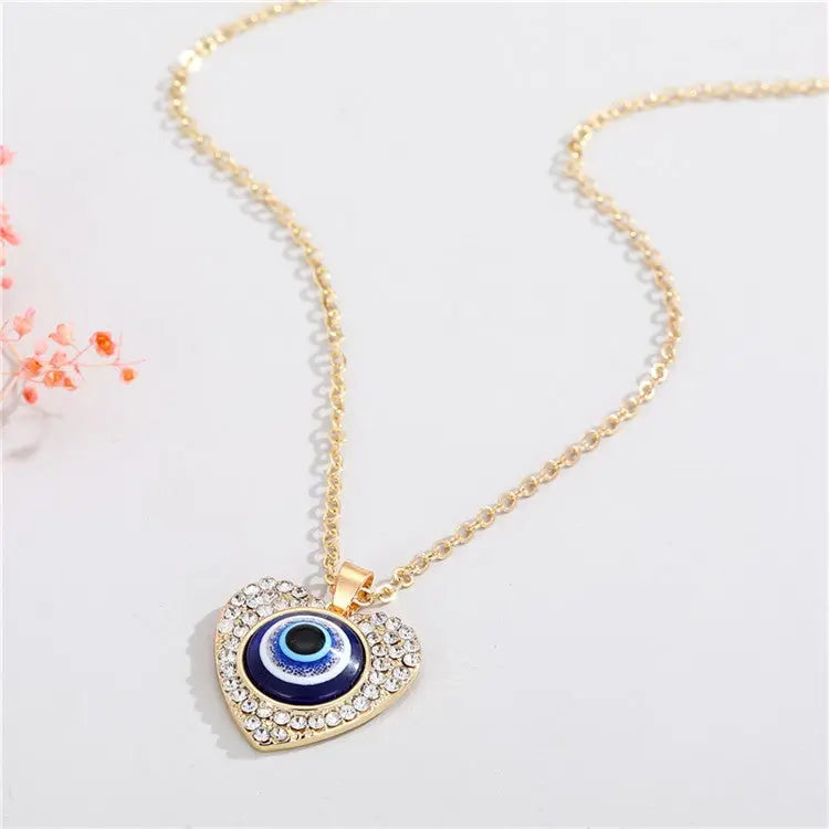 Bling Heart Evil Eye Necklace Xtina Cosmetics